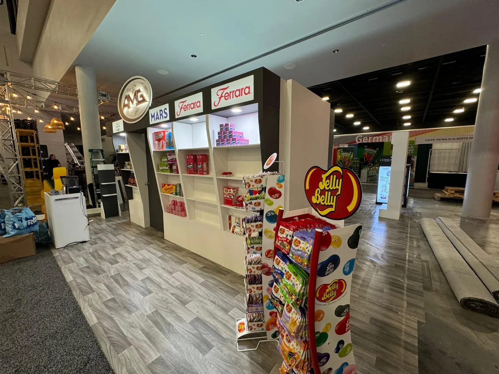 Professional trade show booth designed and built by Habitar 91 for AMG Global Distribution, featuring custom branding, signage, and display elements in Miami, Florida.