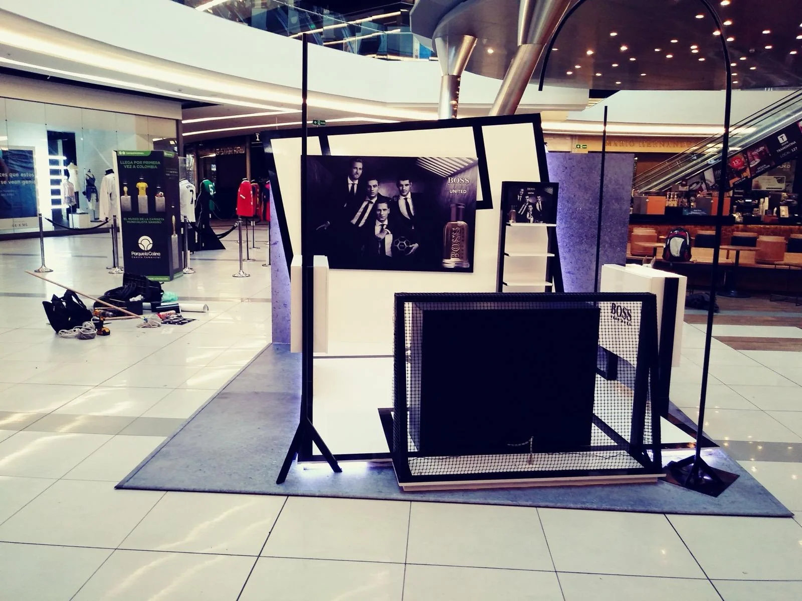 Custom branded retail display for Boss store featuring modern commercial interior design and fabrication by Habitar 91