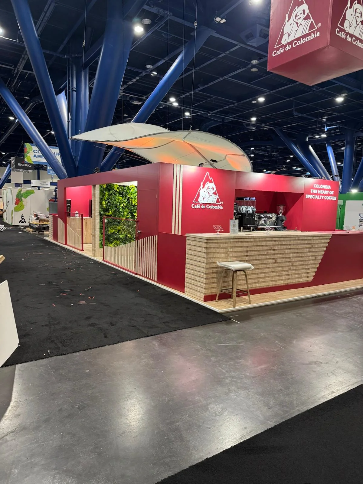 Custom trade show booth design and fabrication for Café de Colombia at San Diego convention center by Habitar 91