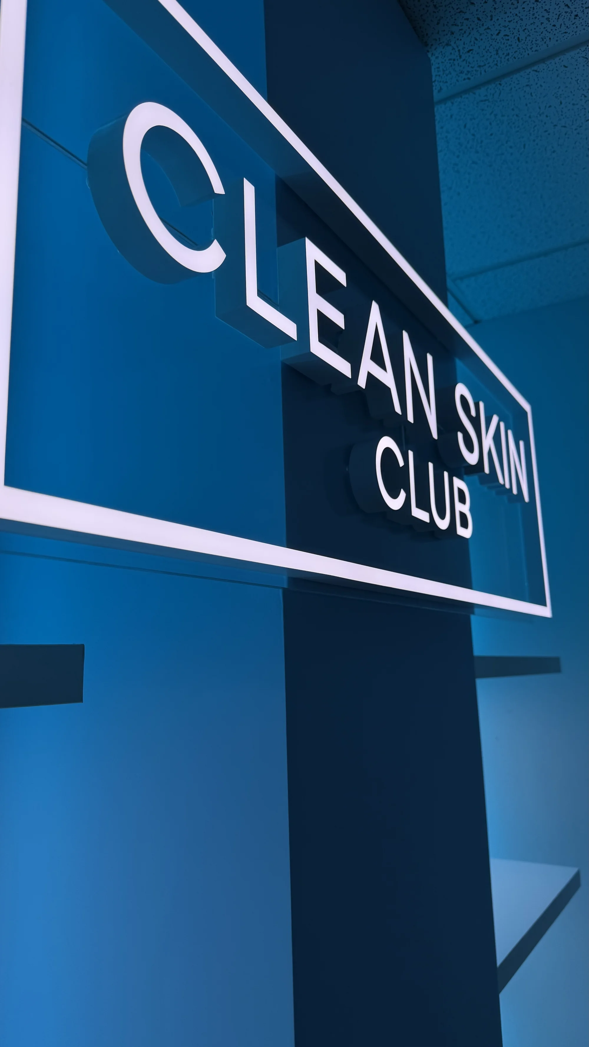 Modern TikTok-themed room installation for Clean Skin Club featuring branded environment design and custom wall graphics in Weston, Florida