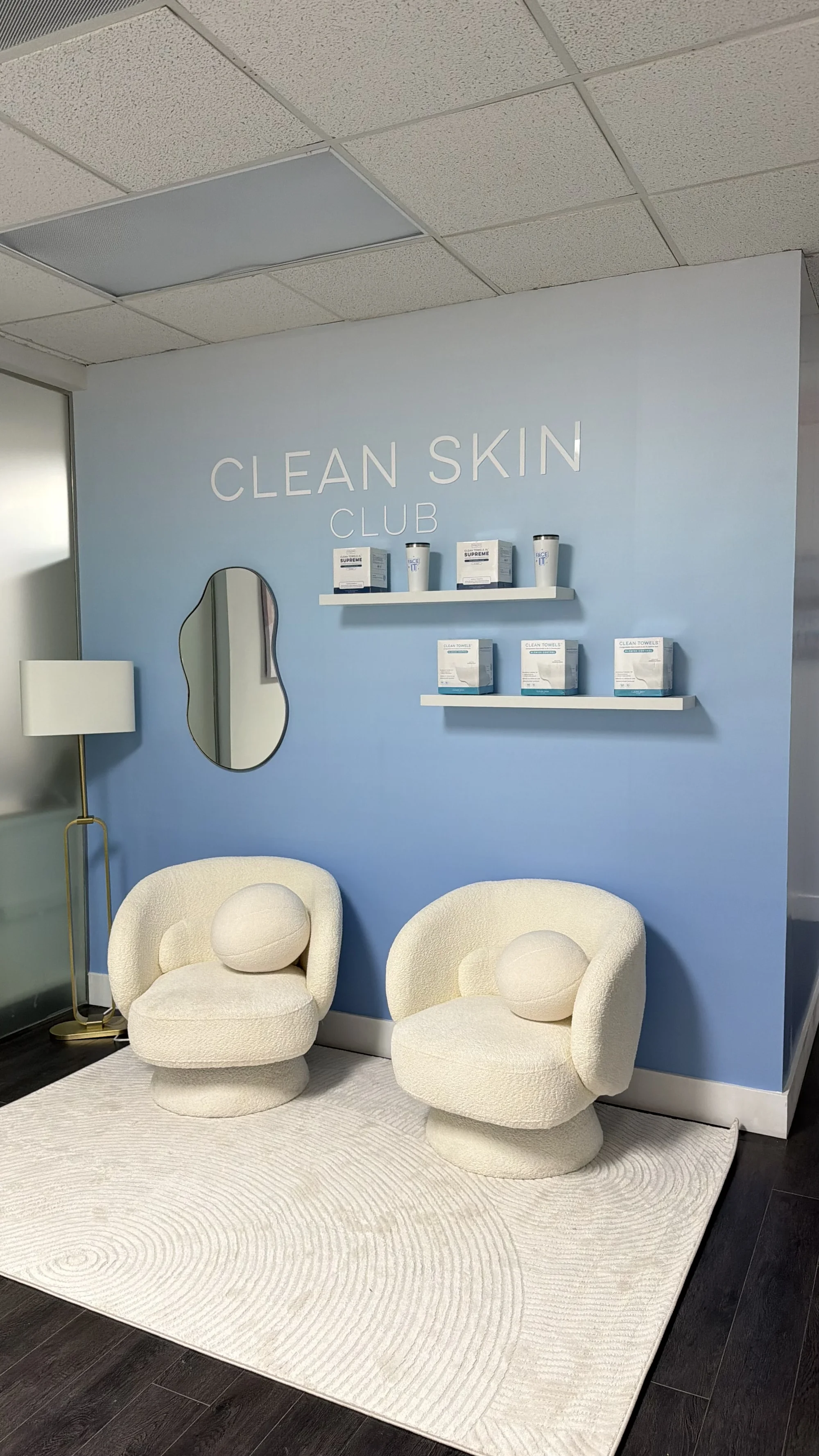 Modern wall graphics installation for Clean Skin Club featuring sleek branding design on interior wall in Weston, Florida
