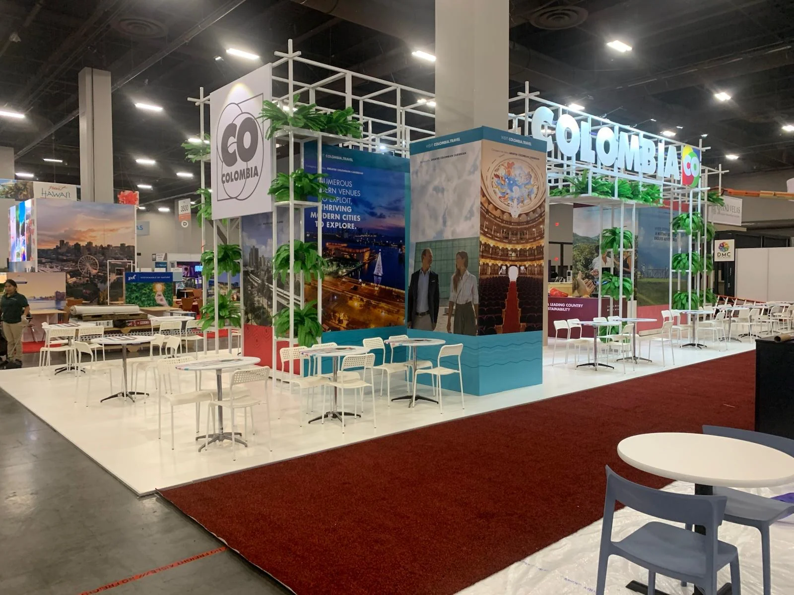Modern trade show booth for Co Colombia featuring custom branding, professional display design, and branded environments at San Diego event
