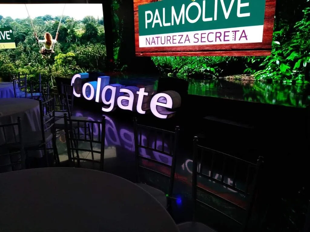 Custom illuminated and dimensional signage for Colgate brand activation event, featuring professional design and fabrication by Habitar 91