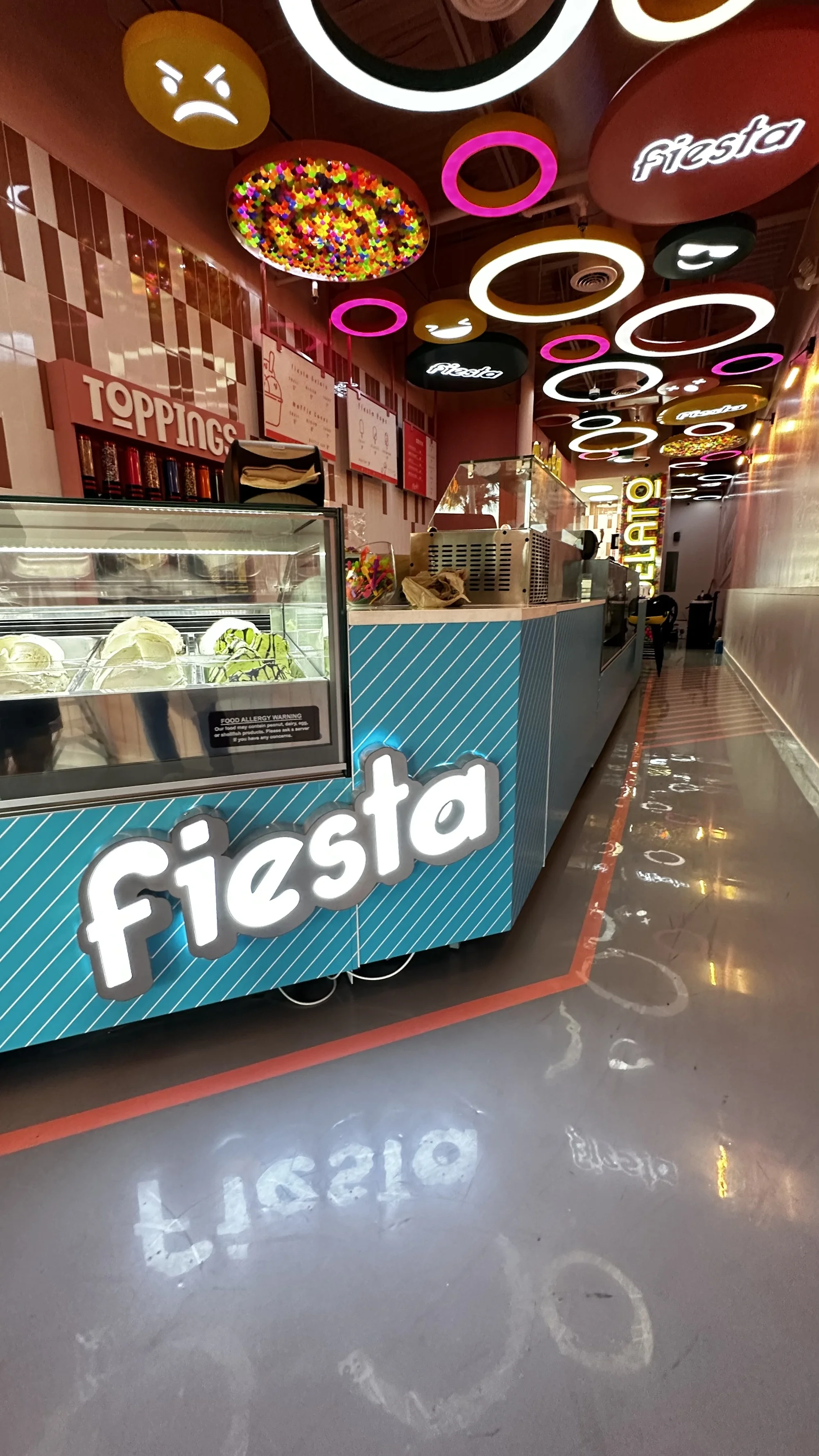 Interior construction and buildout of Fiesta ice cream store in Port Saint Lucie, Florida, showcasing commercial design and installation work by Habitar 91.