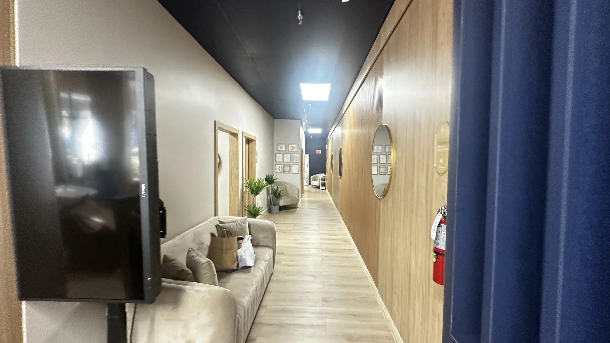 Modern medical spa interior buildout by Habitar 91 featuring custom design elements, professional finishes, and branded environments in Davie, Florida