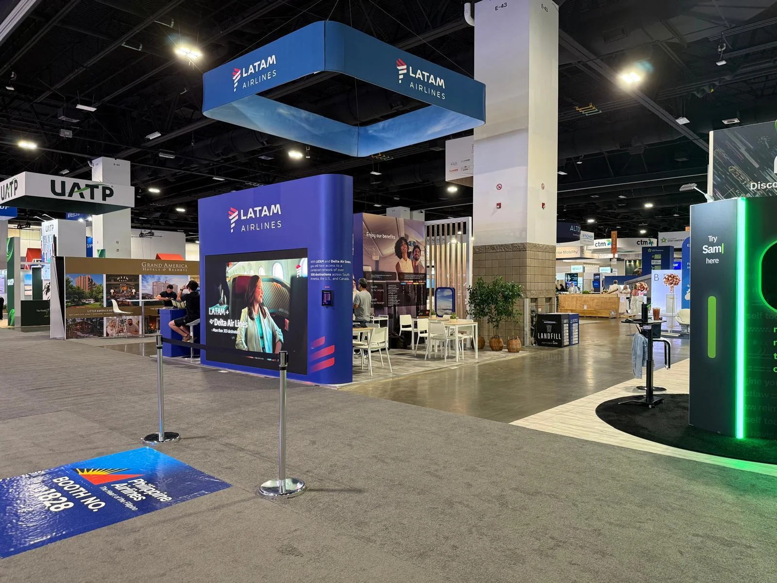 Professional trade show booth design for LATAM Airlines at Aviation Forum in Denver, Colorado, featuring branded environment with custom graphics and modern display elements
