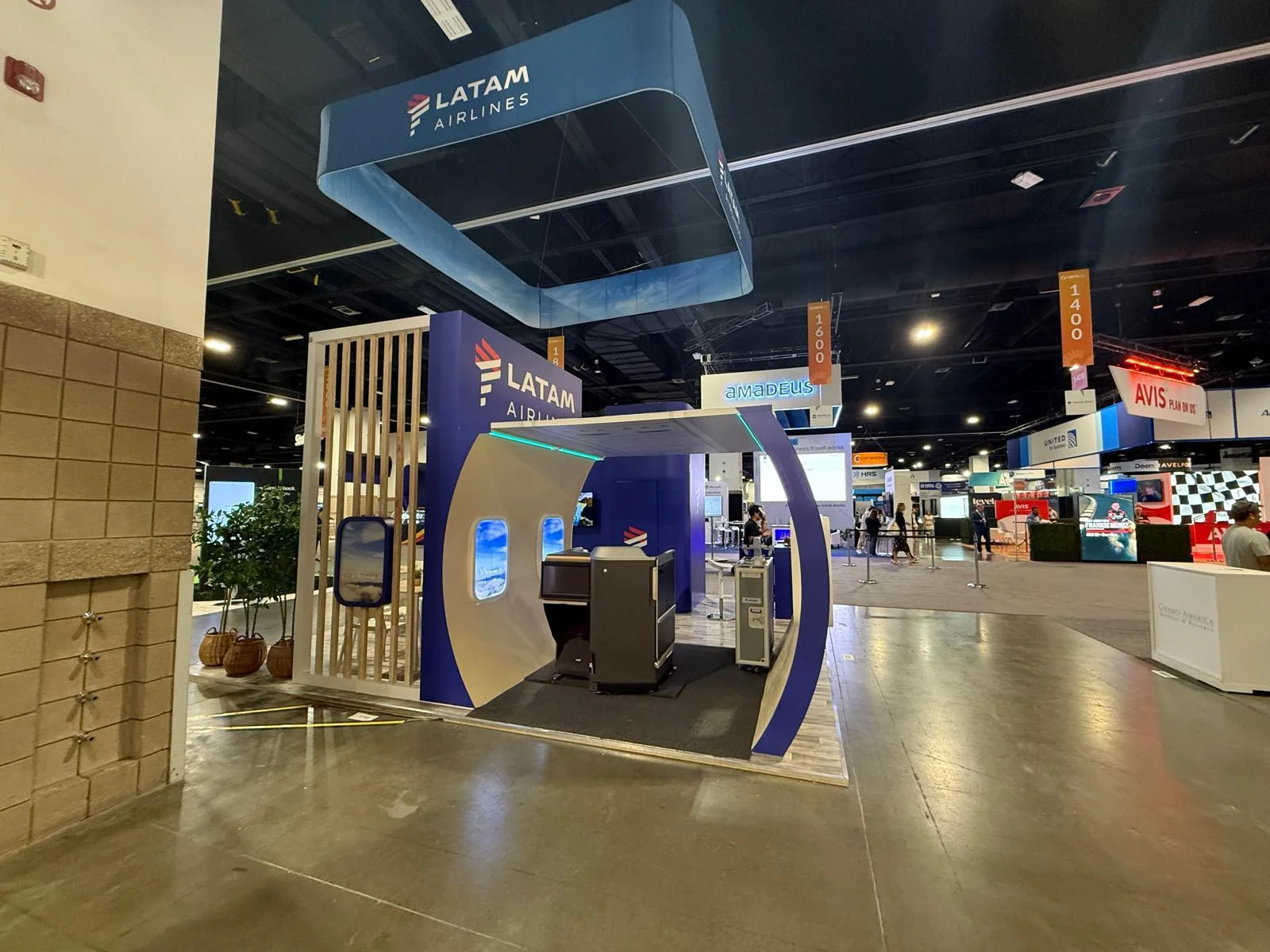 Professional trade show booth design for LATAM Airlines at Aviation Forum in Denver, Colorado, featuring branded environment and custom display elements