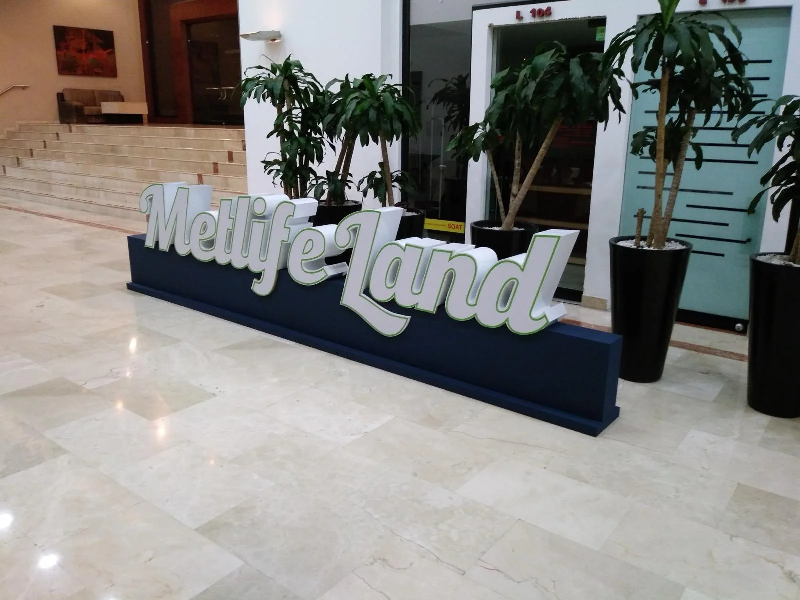 Professional event signage and branded environmental graphics for MetLife brand activation, featuring custom-designed wayfinding and promotional displays