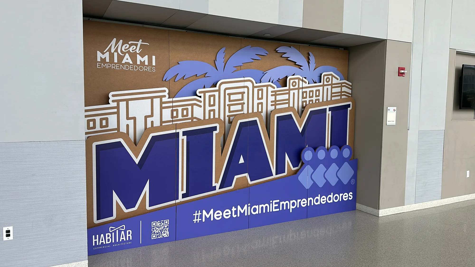 Professional brand event activation setup for Miami Emprendedores featuring custom branded environments and experiential design elements