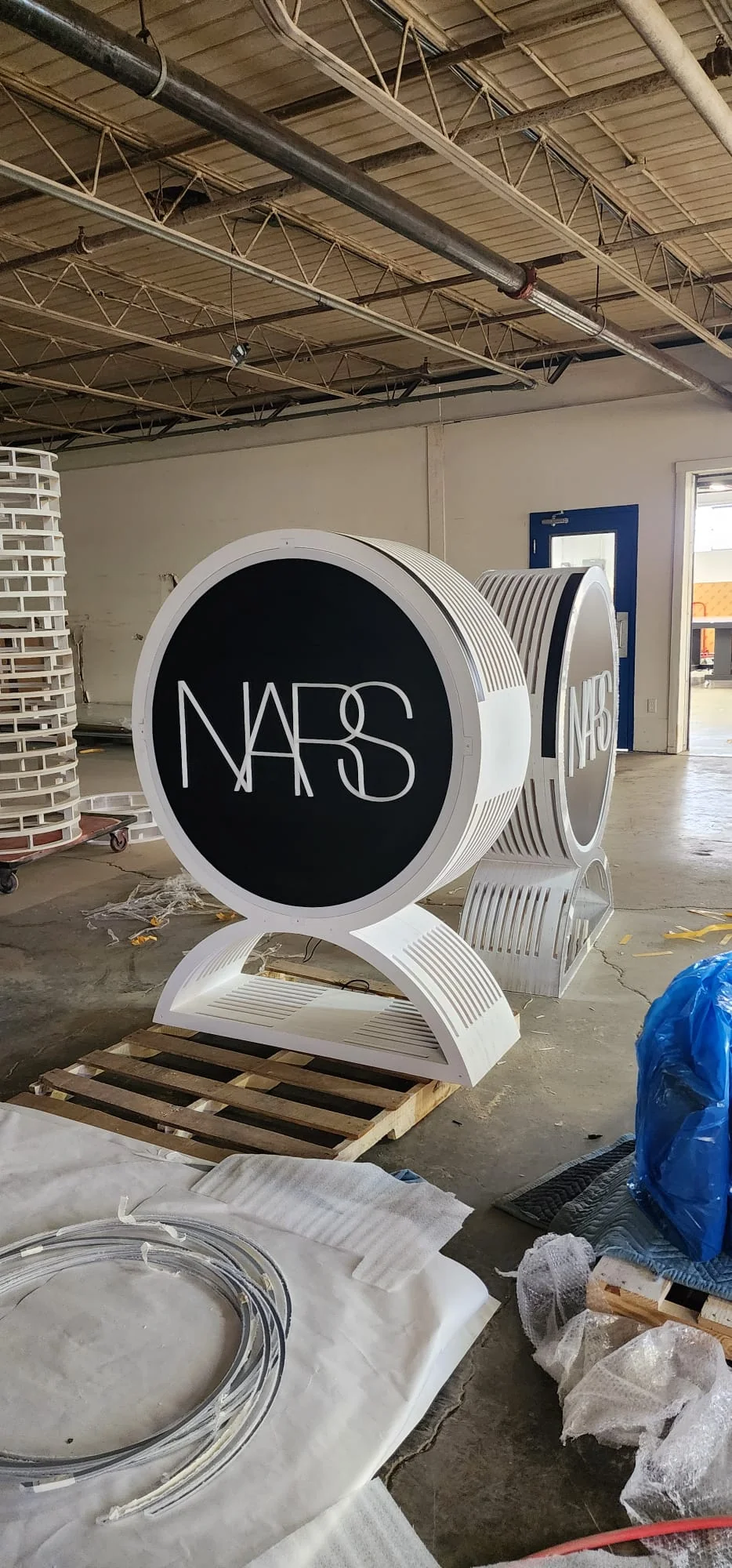 Professional brand activation event setup featuring NARS cosmetics branding, custom display elements, and experiential design created by Habitar 91 in South Florida.