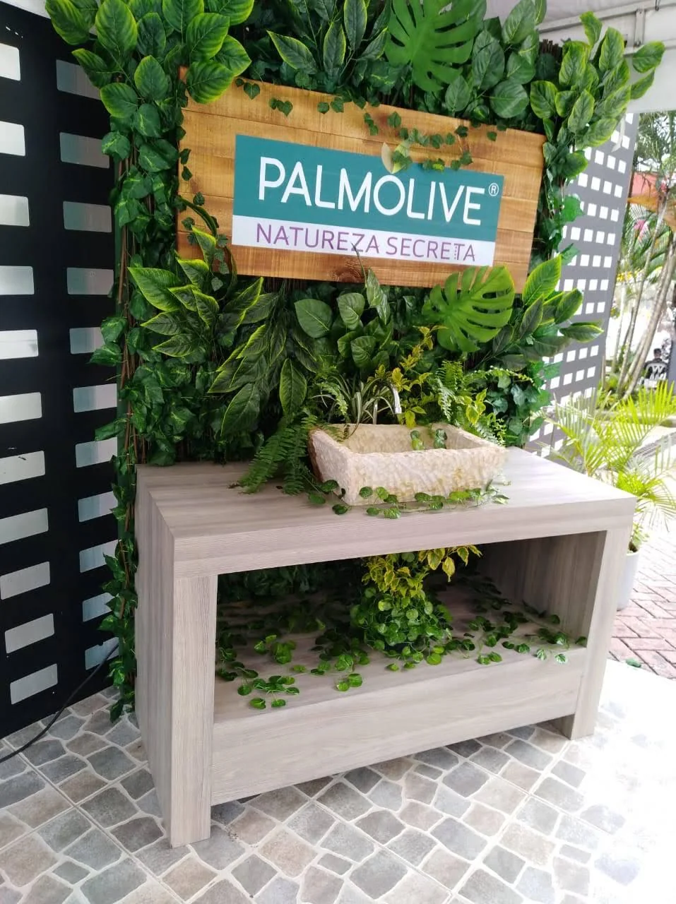 Custom branded backdrop display for Palmolive brand activation event, featuring professional design and fabrication by Habitar 91