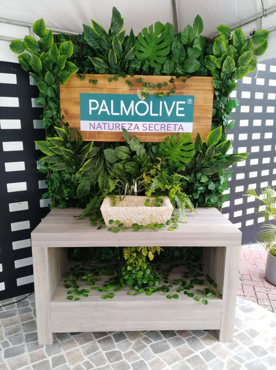 Custom branded backdrop display for Palmolive brand activation event, featuring professional design and fabrication by Habitar 91