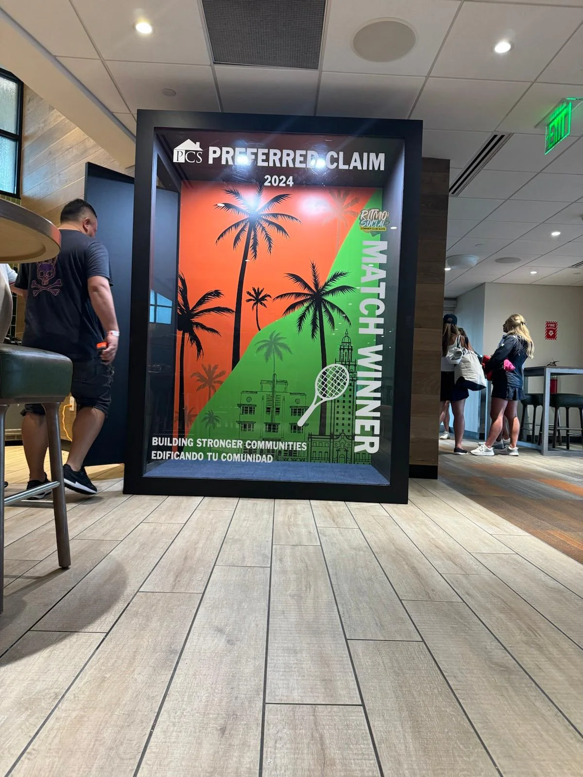 Professional brand activation event setup featuring custom designed environment with PCS branding, modern display elements, and experiential design created by Habitar91