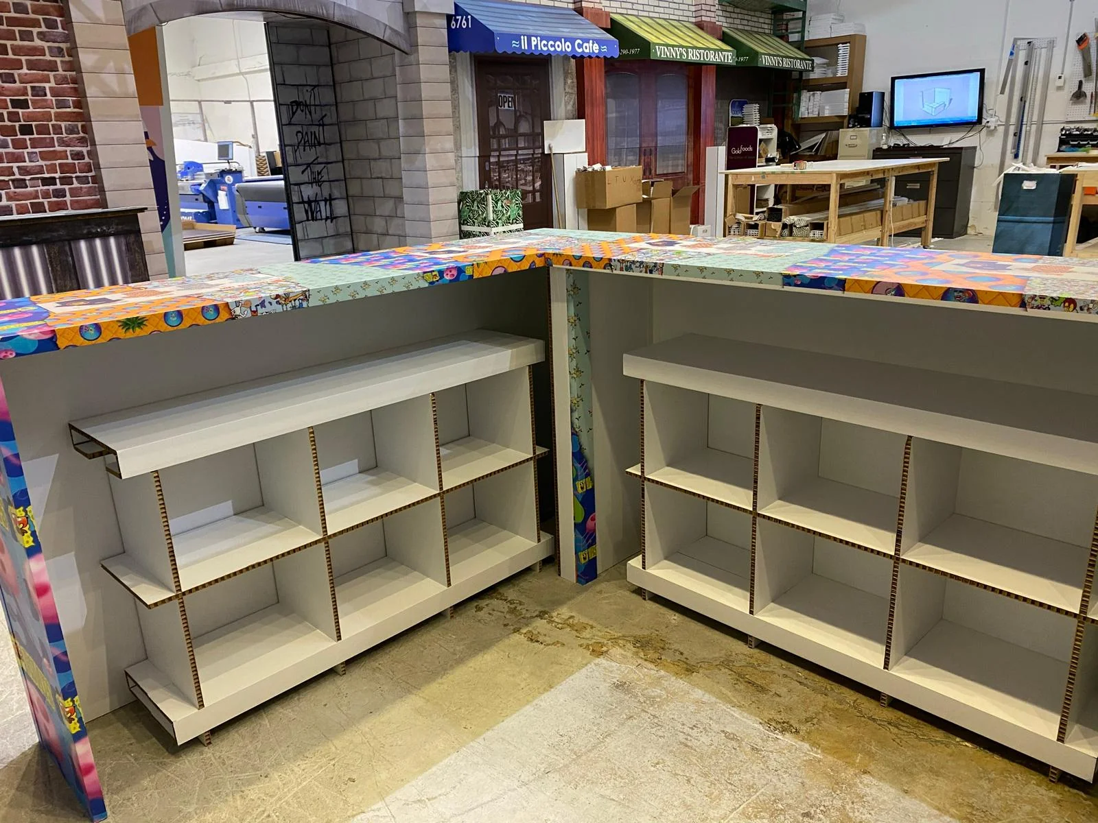 Custom cardboard trade show booth for RSVLTS featuring branded design and structural elements, showcasing Habitar 91's fabrication and installation capabilities.